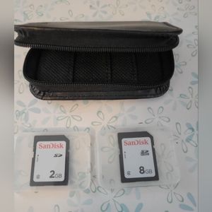 Two SanDisk SD cards 1- 8gb & 1- 2gb with storage case all NEW